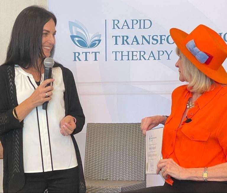 Monika with RTT Founder Marisa Peer on stage